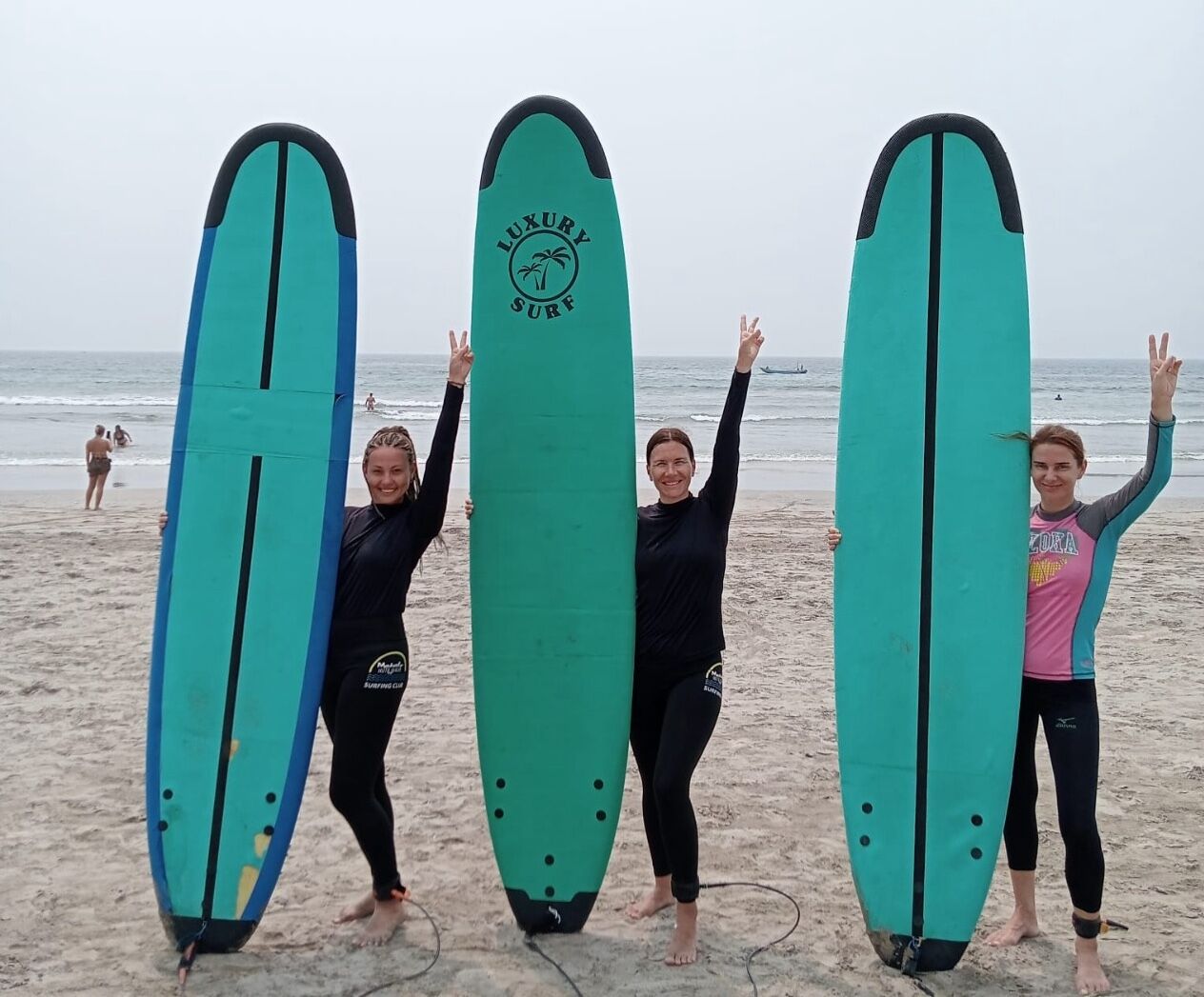 Advanced surfer performing maneuvers on a perfect wave